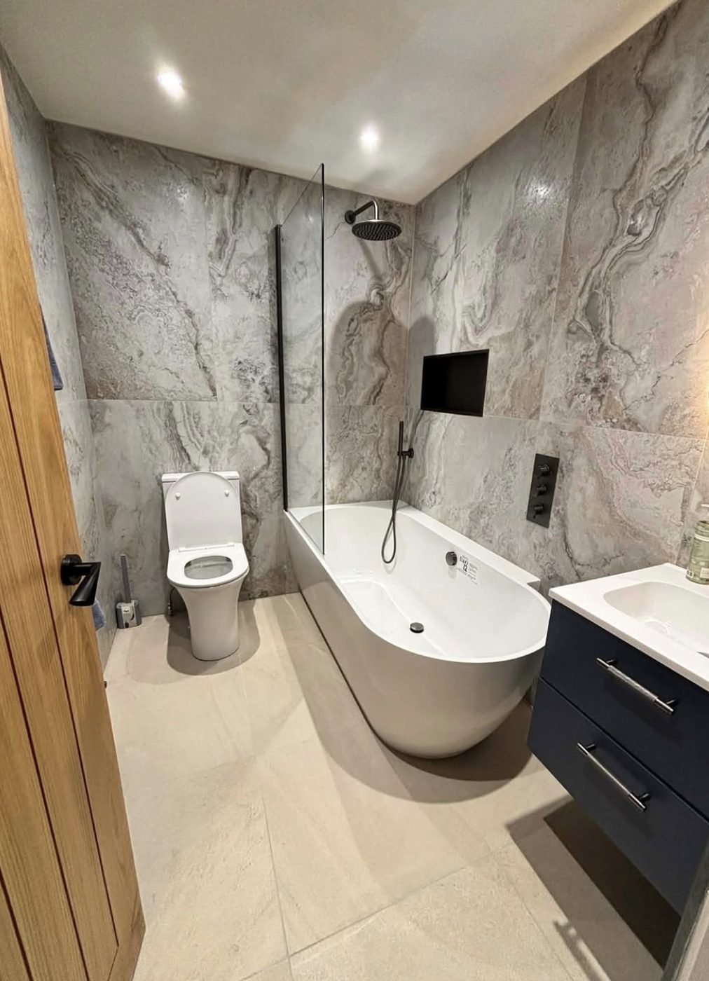 Marble bathroom fitted by Plumbers Done Right Castleford